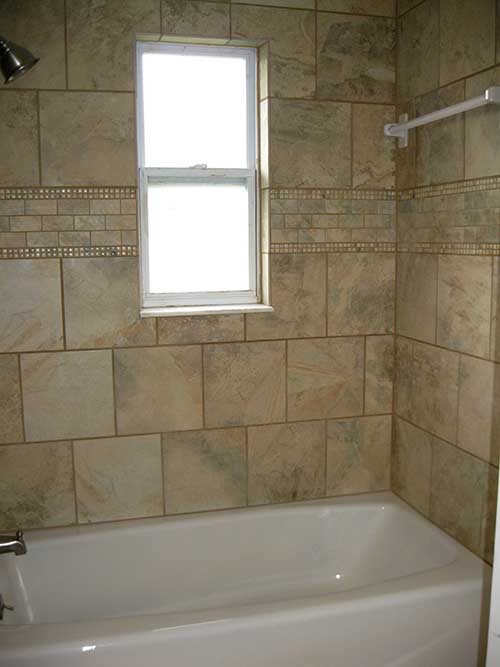 Cast Iron tub and beautiful tile.