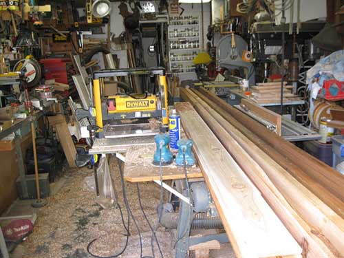 Milling out rough cut cedar.