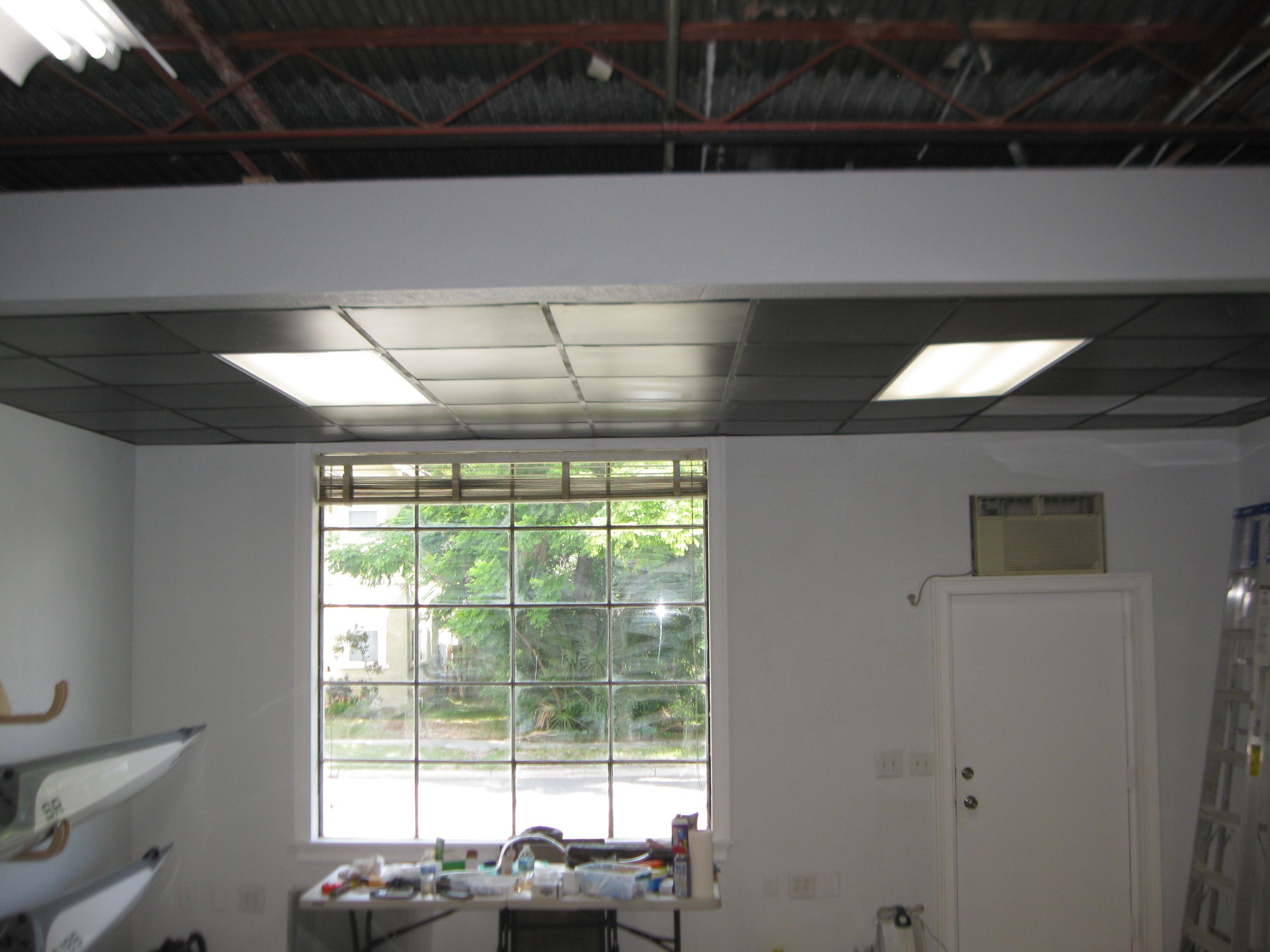 Ceiling grid panels back in.